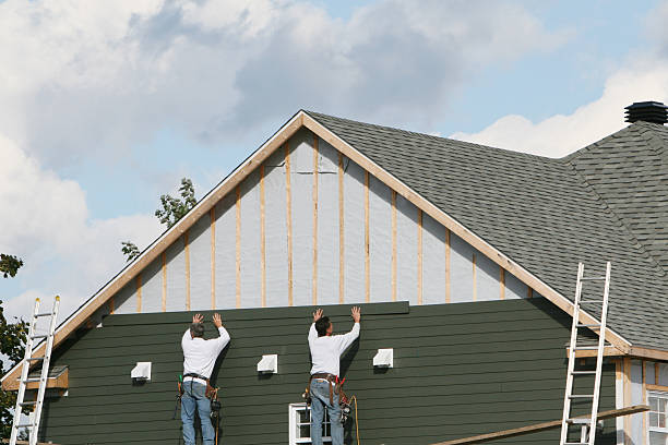 Professional Siding Contractor technician working in Lewisville, OH